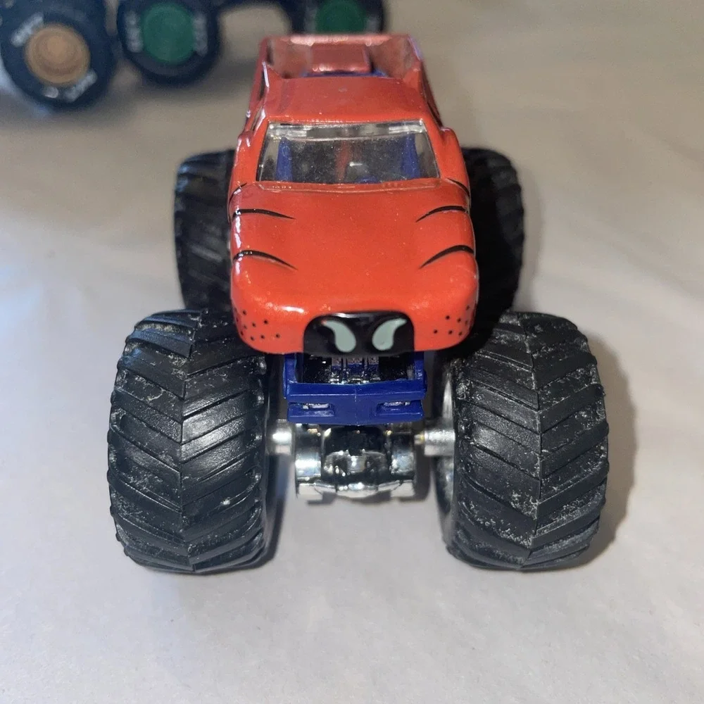 Four Monster Truck Metal Body Diecast 1:64